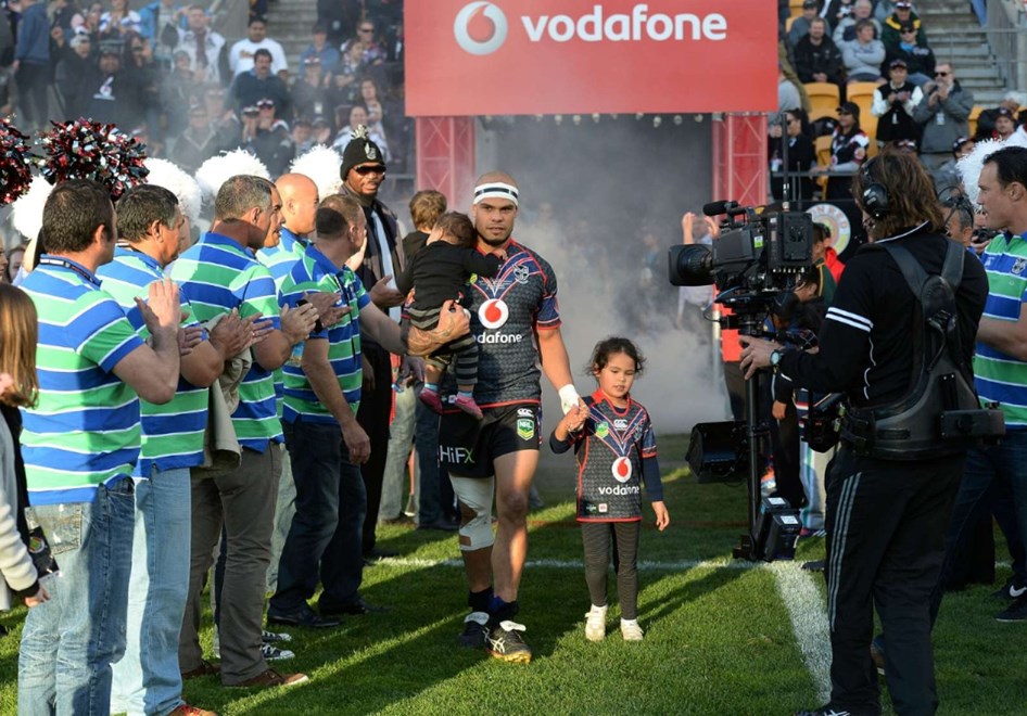 Sam Rapira with family leads the team out. NRL Rugby League match, Vodafone Warriors v Canberra Raider at Mt Smart Stadium in Auckland on Saturday 31 August 2013. Photo: Andrew Cornaga/www.Photosport.co.nz