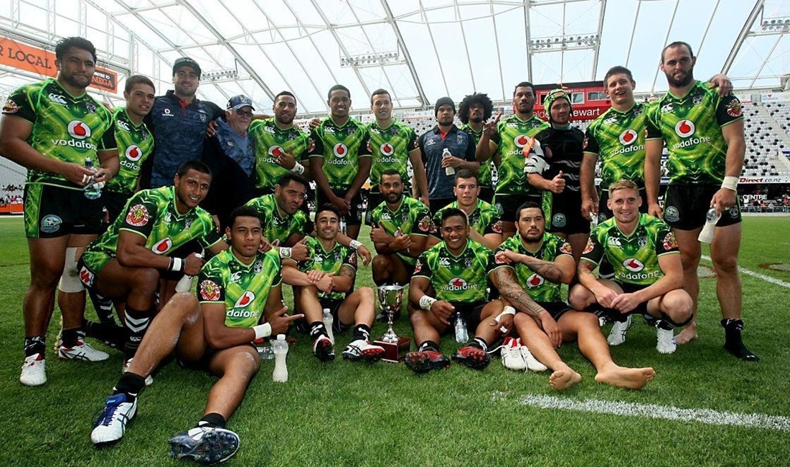 Warriors pose for a photo after winning against the Broncos in the NRL preseason match, Forsyth Barr Stadium, Dunedin, New Zealand, Sunday, February 23, 2014. Photo: Dianne Manson / photosport.co.nz