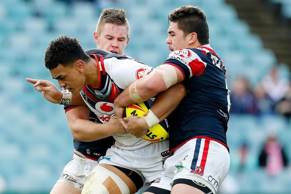 Vodafone Junior Warriors  second rower Ken Maumalo dents the Sydney Roosters' line in last week's NYC finals clash at Allianz Stadium. Image | Paul Barkley