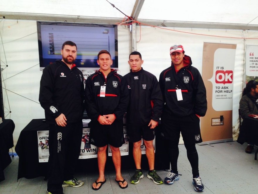 Luke Tipene (second from left) working at the 2014 NZRL National Secondary Schools tournament with Vodafone Warriors football operations coordinator Jordan Friend and development players Taine Eason-Tipene (Luke's cousin) and Troy Pulupaki.