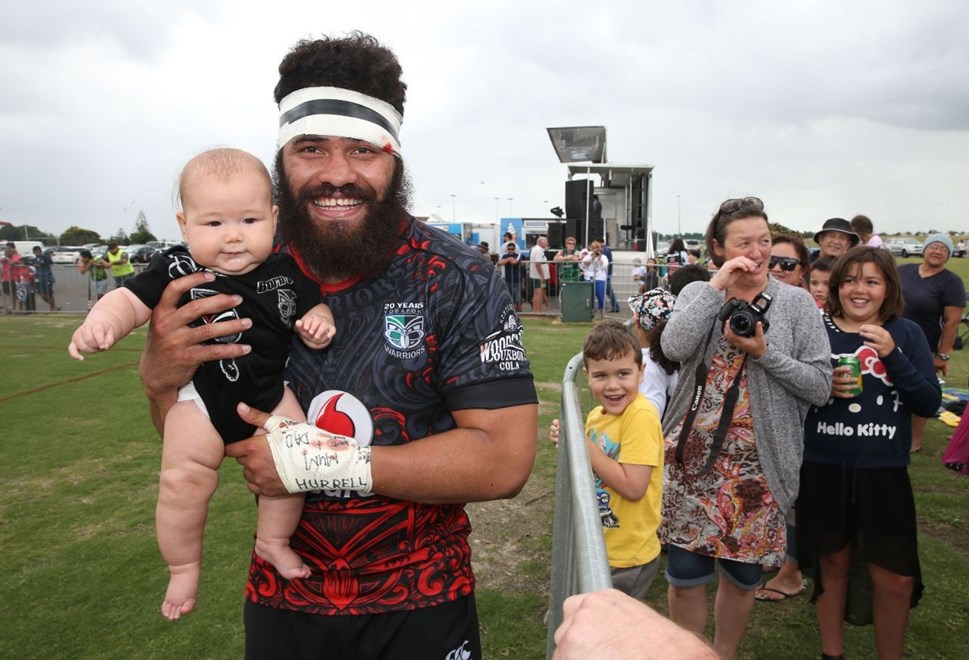 4 month year old Eliza McCready meets Konrad Hurrell after the Warriors NRL v Warriors NSW Cup Trial Match,  held at Bruce Pulman Park in Papakura, South Auckland  on 21 February 2015. .Credit; Peter Meecham/ www.photosport.co.nz