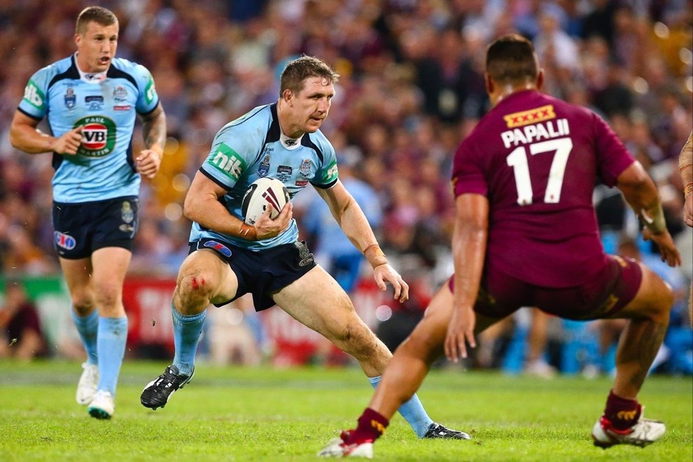 New South Wales second row Ryan Hoffman runs at Queensland Josh Papalii during the State of Origin match between New South Wales and Queensland at Suncorp Stadium, Brisbane, 28 May 2014.