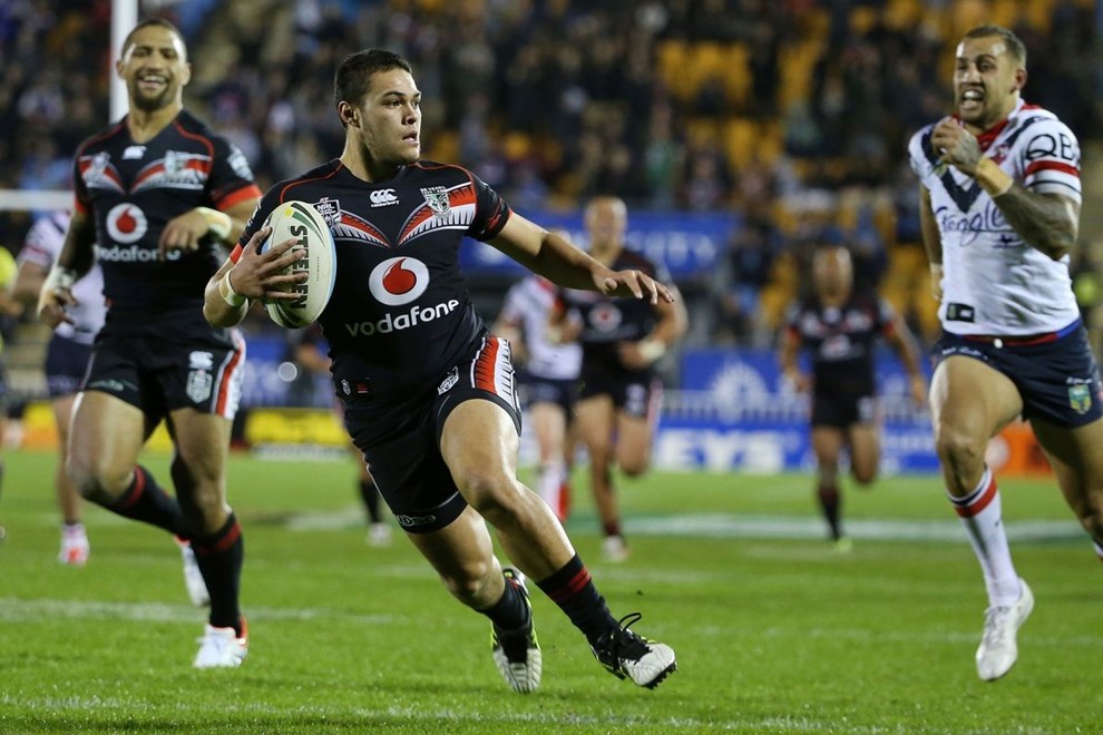 Warrior Tuimoala Lolohea scores a try during the NRL Rugby League match between the Warriors and the Rooster at Mt Smart Stadium, Auckland, New Zealand. Saturday, June 13 2015. Copyright Photo: Fiona Goodall/www.Photosport.co.nz