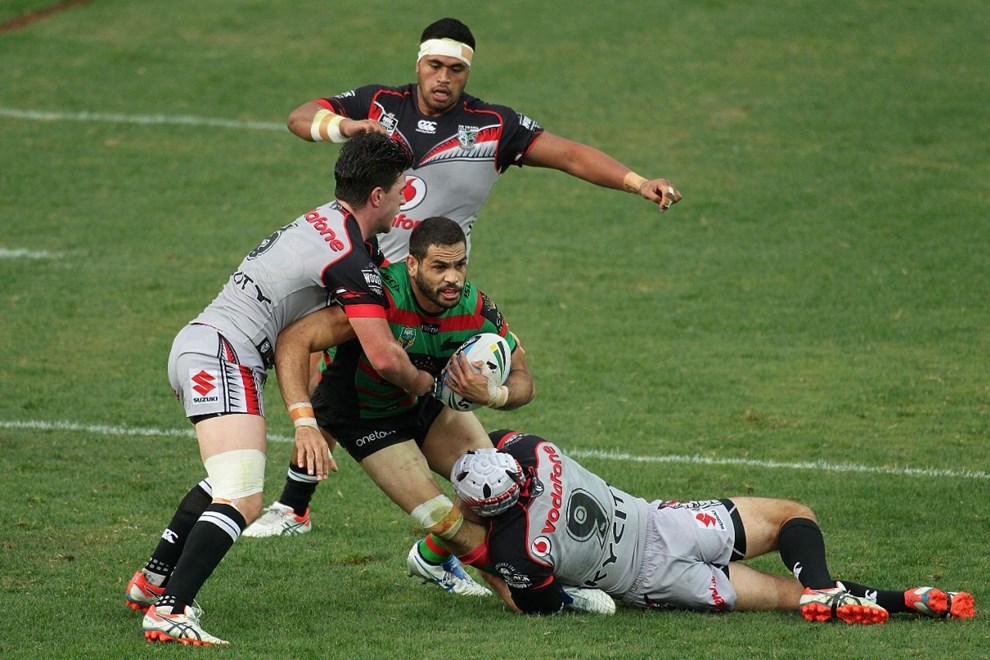 PERTH, AUSTRALIA - JUNE 06:  Greg Inglis of the Rabbitohs is tackled by Nathan Friend and Chad Townsend of the Warriors during the 2015 NRL Round 13 Rugby League match between the Vodafone Warriors and The Rabbitohs at NIB Stadium, Perth, Australia on June 6, 2015. (Copyright photo Will Russell/www.Photosport.co.nz)