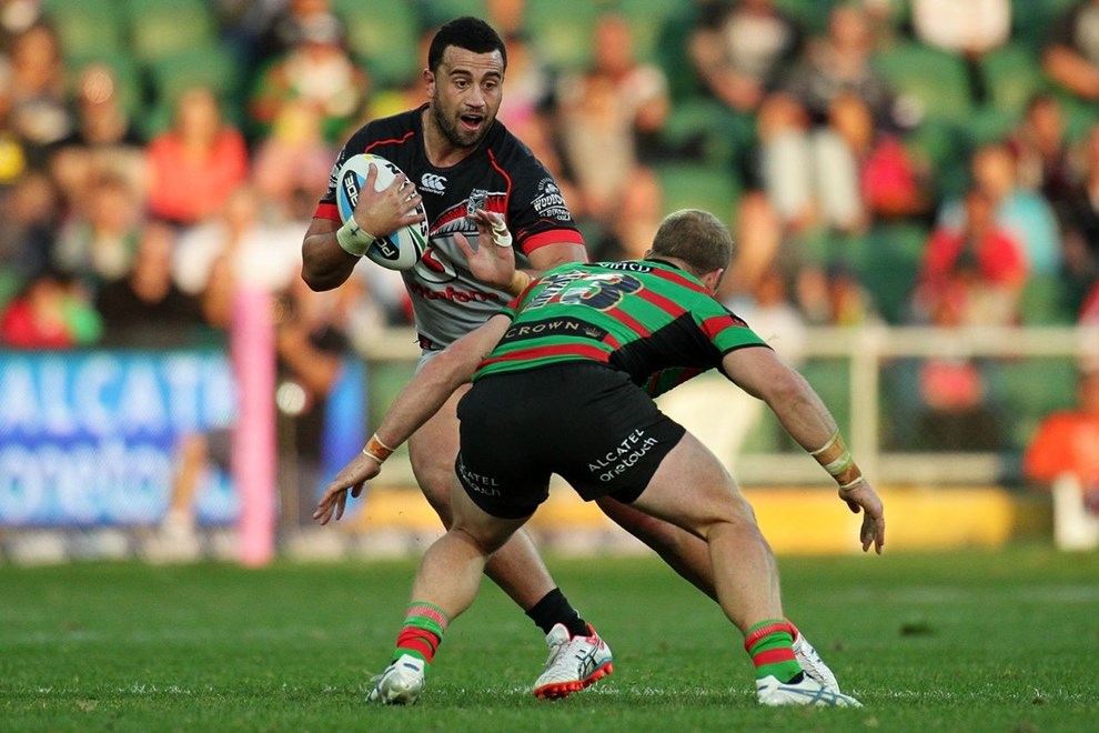 PERTH, AUSTRALIA - JUNE 06:  Ben Matulino of the Warriors tries to evade the  tackle by Ben Lowe of the Rabbitohs during the 2015 NRL Round 13 Rugby League match between the Vodafone Warriors and The Rabbitohs at NIB Stadium, Perth, Australia on June 6, 2015. (Copyright photo Will Russell/www.Photosport.co.nz)
