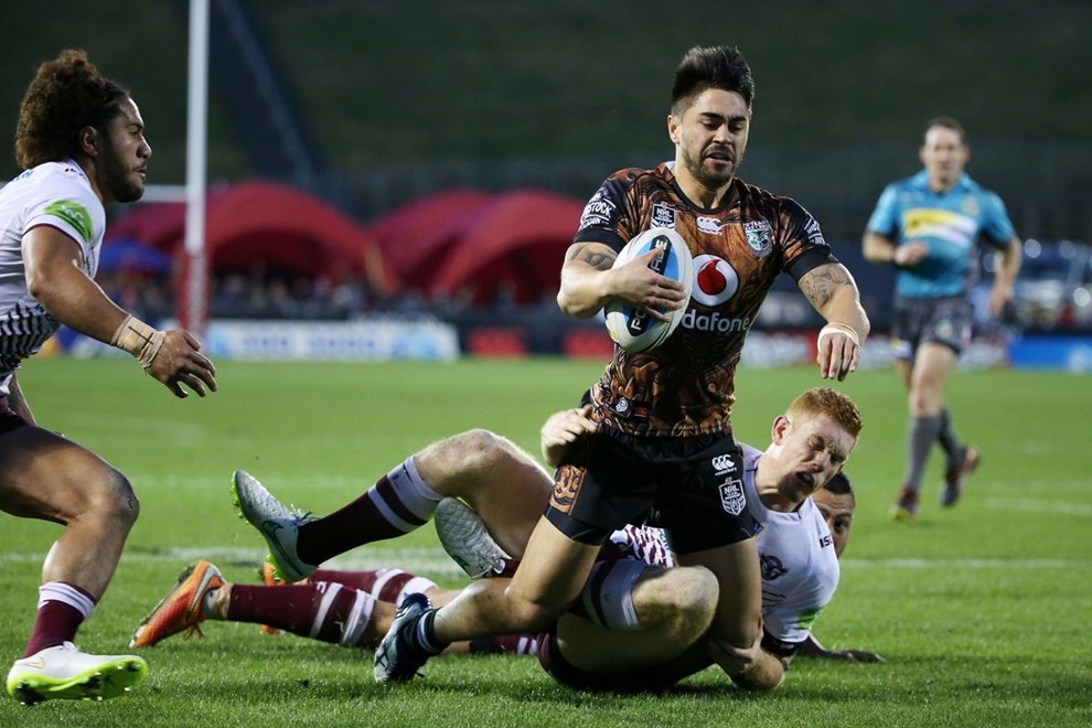 Warriors player Shaun Johnson is injured as he scores a try in the NRL Rugby League, Warriors v Sea Eagles at Mt Smart Stadium, Auckland, New Zealand. 25 July 2015. Copyright Photo: Fiona Goodall / www.photosport.nz