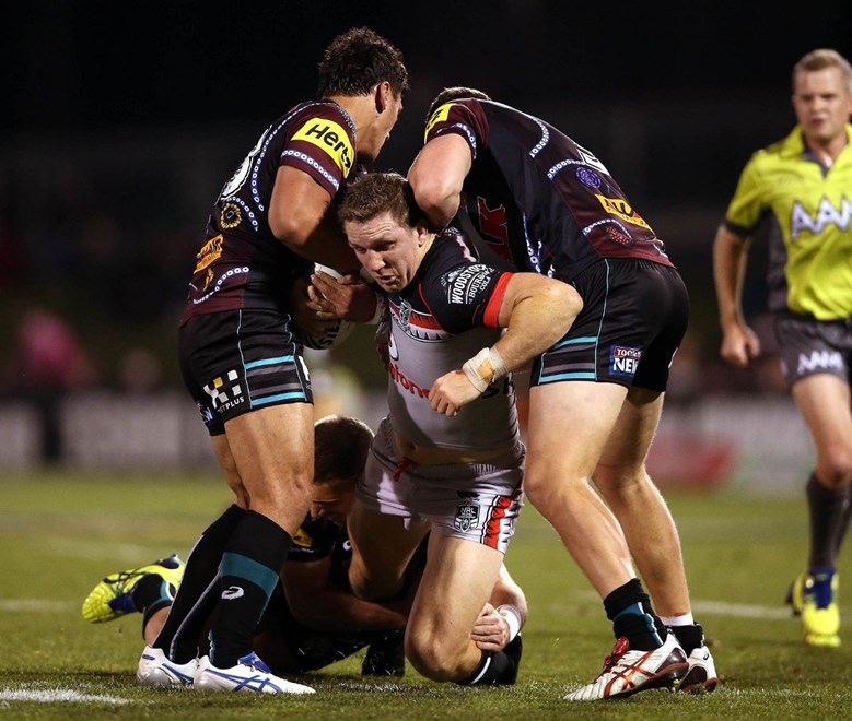 Ryan Hoffman tackled by Elijah Taylor and Reagan Campbell-GillardPanthers v Warriors NRL rugby league match at Pepper Stadium, Penrith Australia. Saturday 15 August 2015. Photo: Paul Seiser/Photosport.co.nz
