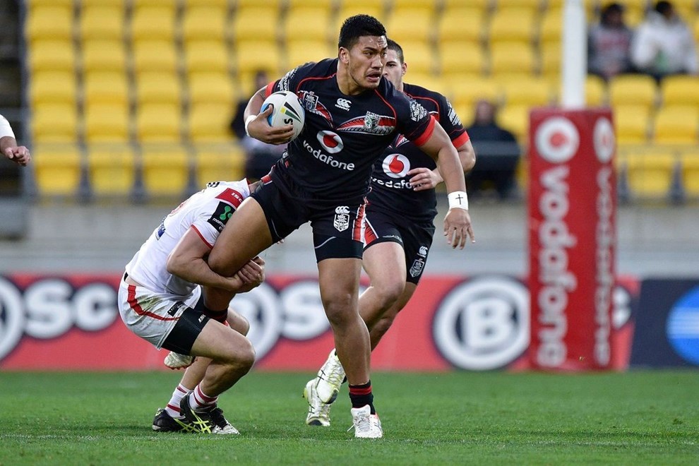 Albert Vete of the Warriors looks to pass as he is tackled by Euan Aitken of the Dragons during the NRL Rugby League match between the Vodafone Warriors & St George Illawarra Dragons at the Westpac Stadium in Wellington on Saturday the 8th August 2015. Copyright photo by Marty Melville