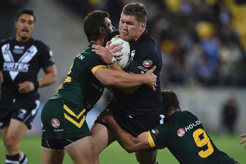 Greg Eastwood (C of the Kiwis is tackled by Greg Bird (L) and Cameron Smith captain of the Kangaroos during the Four Nations Final, Kiwis v Kangaroos rugby league match at the Westpac Stadium in Wellington on Saturday the 15th of November 2014. Photo by Marty Melville/www.Photosport.co.nz