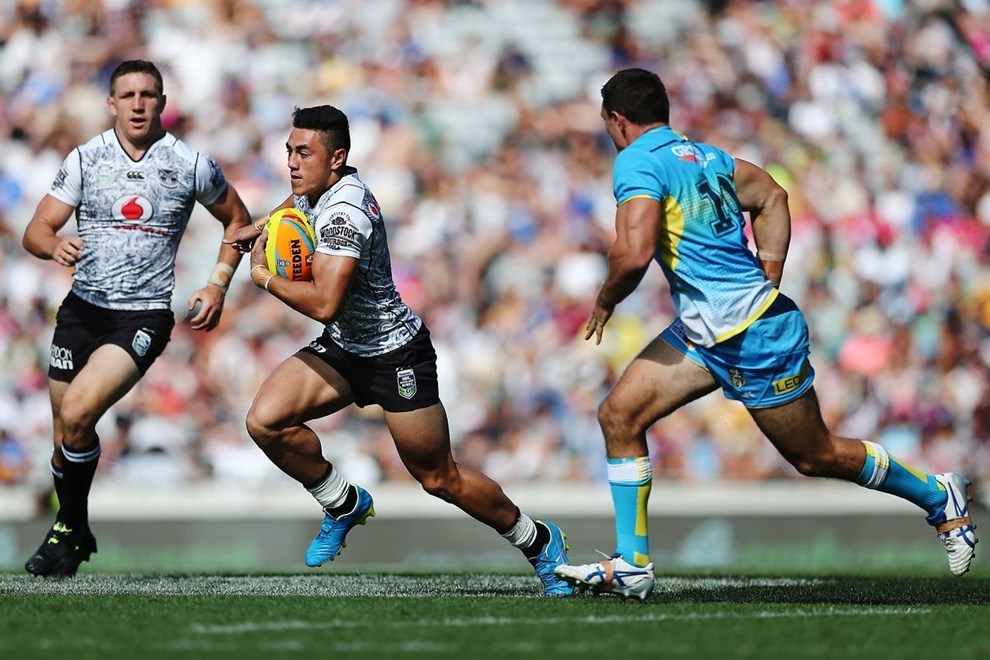 Nathaniel Roache of the Warriors makes a run against the Titans in the semi final during Day 2 of the NRL Auckland Nines Rugby League Tournament, Eden Park, Auckland, New Zealand. Sunday 7 February 2016. Photo: Anthony Au-Yeung / www.photosport.nz