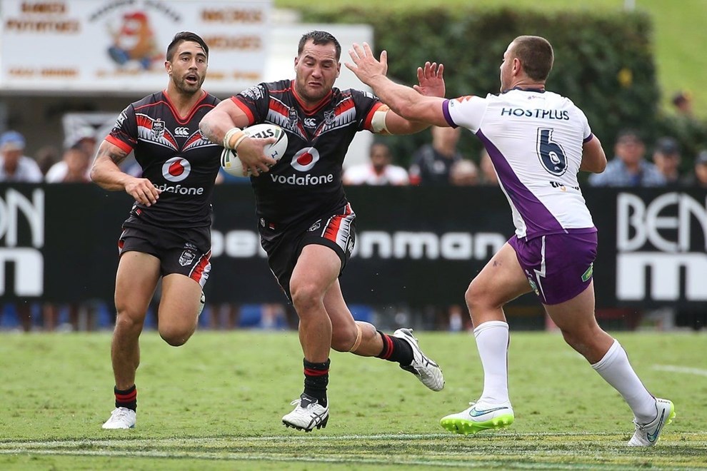Warrior Bodene Thompson, left gets past  the Storm's  Blake Green in the NRL match between the NZ Warriors and the Storm at Mt Smart Stadium on Sunday, march 20, 2016. Photo: Fiona Goodall/photosport.nz