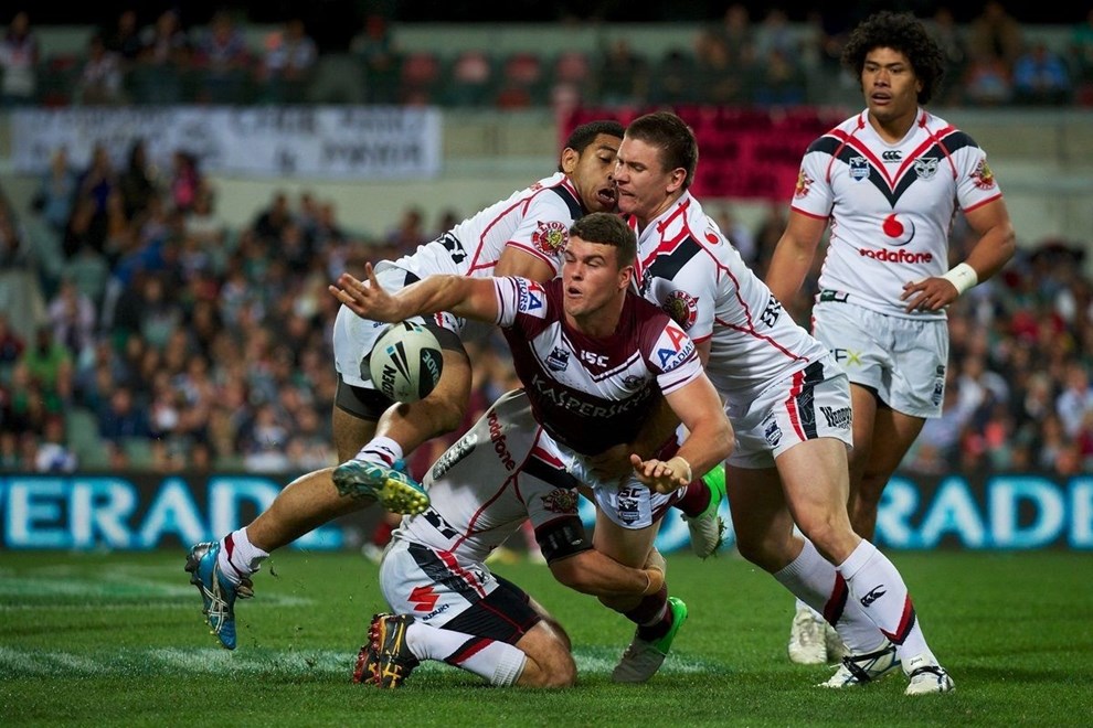 Darcy Lussick gets a pass off in a tackle during the NRL Rugby League match, Vodafone Warriors v Manly Sea Eagles at Patersons Stadium, Perth, Australia on Saturday 28 July 2012. Photo: Daniel Carson/photosport.co.nz