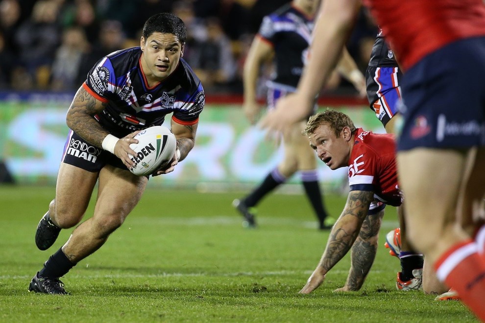 Issac Luke of the Warriors takes on the Roosters during the NZ Warriors v Roosters at Mt Smart Stadium