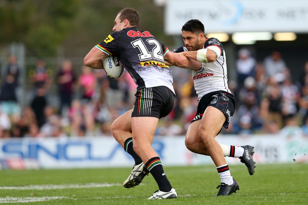 Isaah Yeo of the Panthers is tackled by Shaun Johnson of the Warriors.
Penrith Panthers v Vodafone Warriors