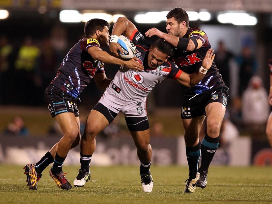 Solomone Kata tackled by Tyrone Peachey and Sam McKendryPanthers v Warriors NRL rugby league match at Pepper Stadium, Penrith Australia. Saturday 15 August 2015. Photo: Paul Seiser/Photosport.co.nz
