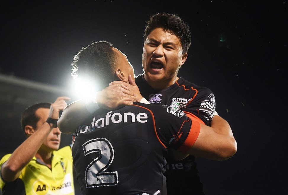 Mason Lino celebrates Ken Maumalo's try during the NRL Rugby League match between the Vodafone Warriors and The North Queensland Cowboys at Mt Smart Stadium, Auckland, New Zealand. Saturday 22 August 2015. Copyright Photo: Andrew Cornaga / www.Photosport.nz