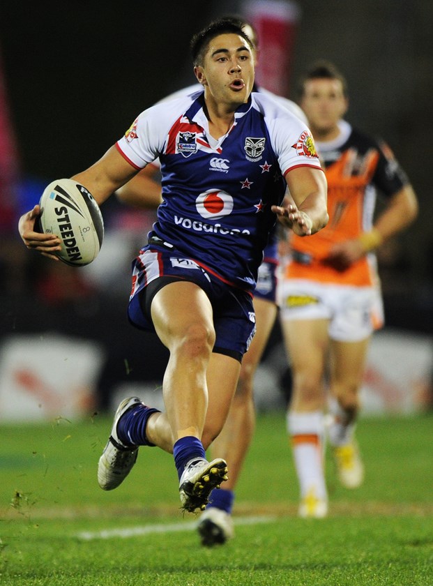 Shaun Johnson try-bound for his first NRL points against the Wests Tigers in 2011.